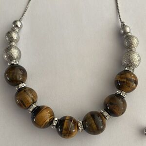 Adjustable length brown and silver beaded necklace